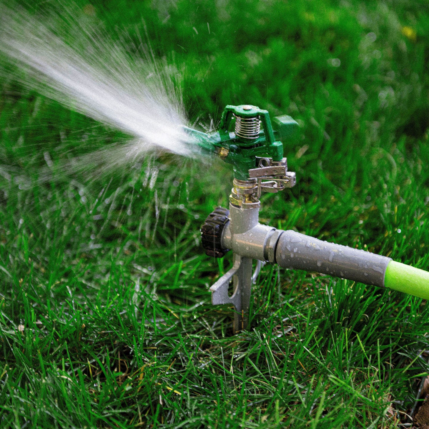 Metal Pulsating Spike Lawn Sprinkler (5,600 Sq. Ft. Coverage)