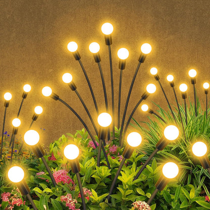 Solar firework starburst light, ground stake close-up