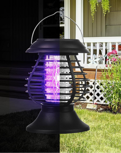 Solar bug zapper hanging in a garden setting