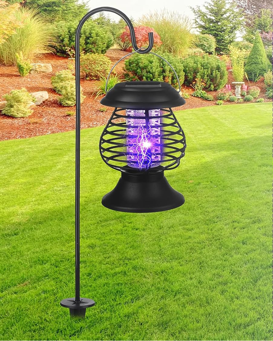 Solar-powered bug zapper with hanging rings for outdoor use, shown in garden and indoor settings.