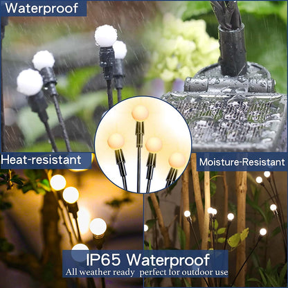 Solar swaying garden lights lining a garden pathway