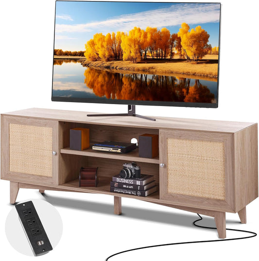 Wooden TV stand with a television displaying a scenic view, accompanied by a power strip.
