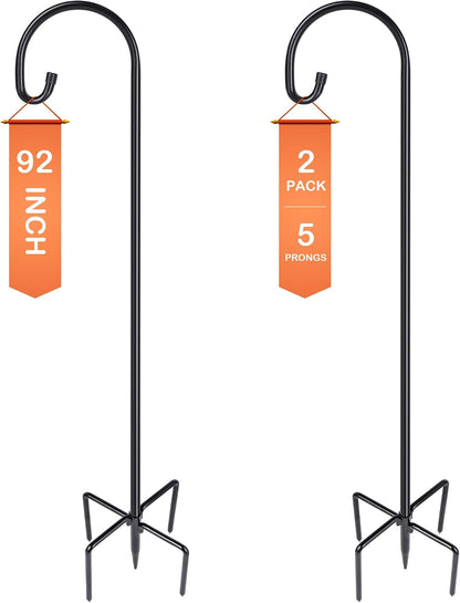 Adjustable shepherd hooks lining a garden walkway