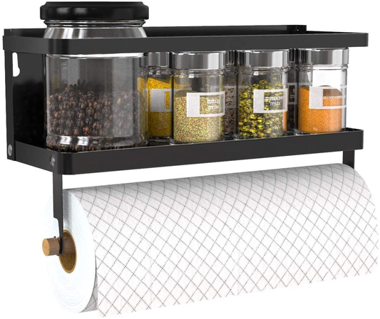 Spice rack with transparent jars containing various spices on a white tiled wall.